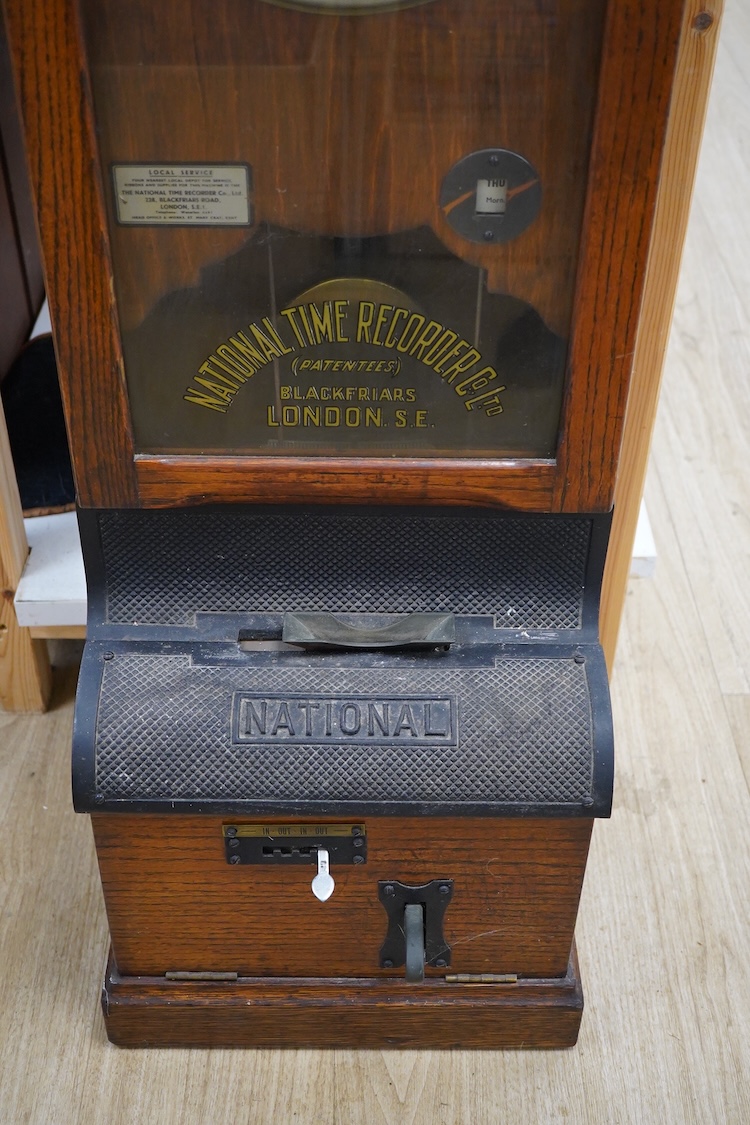 A National Time Recorder Co. Ltd. clocking in clock, 109cm high